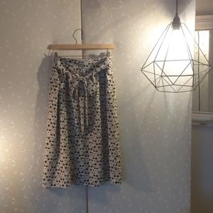 Anthropologie lipstick and sunglasses skirt